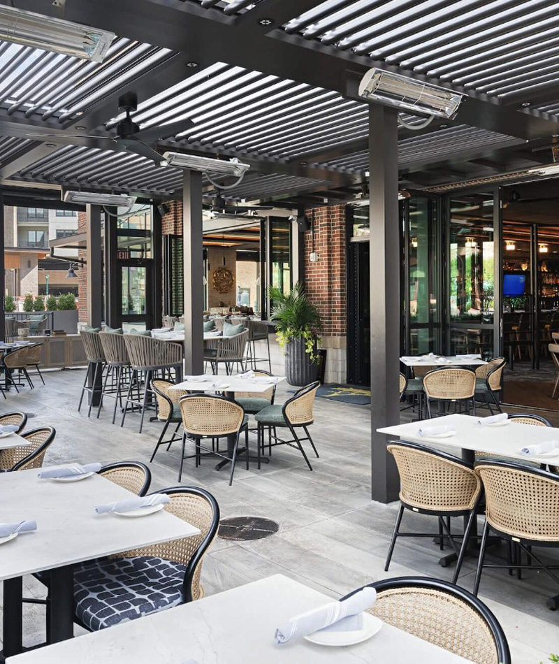 Commercial restaurant pergola with outdoor ceiling fans, infrared heaters, and premium upgrades
