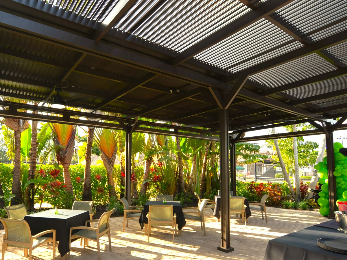 Players Club Spa motorized pergola outdoor dining area