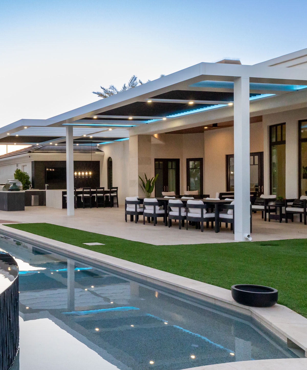 Custom commercial pergola office building Boca Raton StruXure motorized pergola with integrated lighting at a commercial restaurant bar